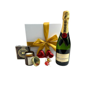 Gift Box Image Medium white gift box, Moët and Chandon Imperial 750ml, Lindt lindor chocolates, chocolate hearts, amberjack candle, davenport chocolates. Batenburgs Gift Baskets Auckland