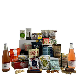 Gift Box Image Extra large wooden gift box with two bottles of non alcoholic sparkling fruit juice, large range of chocolates and snacks Batenburgs Gift Baskets Auckland 