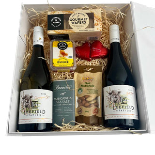Gift Box Image New Zealand Gift Hampers. Luxury thank you gift box with two bottles of wine, nibbles and a chocolate bar. Batenburg's Gift Hampers