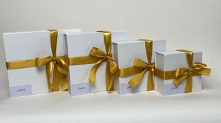 Batenburgs Gift Boxes image shows a row of Gift Baskets ready for delivery NZ Wide
