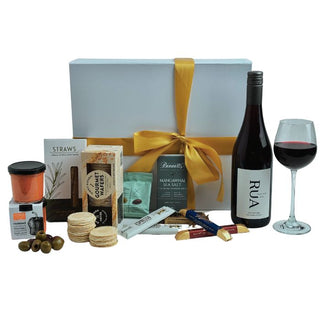 Gift Box Image Luxurious Rua Pinot Noir Wine Gift Box from NZ, paired with gourmet treats including Bennetts of Mangawhai chocolate and savoury bites. Premium gift boxes NZ collection for ultimate celebration moments Batenburgs Gift Baskets Auckland