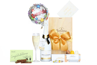 Gift Box Image Medium wooden gift box, with Moët Ice, Congratulations chocolate bar, Congrats balloon and House of Chocolate bon bons  Batenburgs Gift Baskets Auckland 