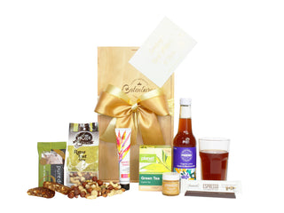 Gift Box Image Medium wooden gift box with Primal nut bar, raw nut mix, 50ml hand cream, green teabag box, j.Friend and Co 40ml honey jar, Phoenix fruit juice and espresso chocolate bar Batenburgs Gift Baskets Auckland
