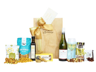 Gift Box Image Large wooden gift box with extra virgin olive oil, pretzel mix, crispy corn nibbles, crackers, Villa Maria Sauvignon Blanc 750ml, napkins, raw nut mix and olives Batenburgs Gift Baskets Auckland