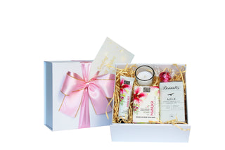 Well being gift with chocolate, hand cream and soap, as well as a candle. Batenburgs Gift Hampers New Zealand