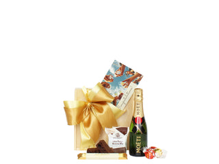 Gift Box Image Small wooden gift box with Mini Moët 200ml, Mrs Higgin's Chocolate brownie, Whittaker's chocolate bar 25g, three individuals Lindt Lindor Batenburgs Gift Baskets Auckland