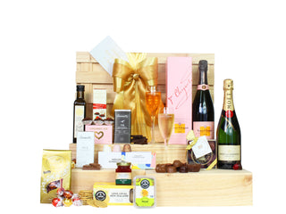 Gift Box Image Extra large wooden gift box with Veuve Clicquot Rosé 750ml, Moët and Chandon Imperial Champagne 750ml, Extra virgin olive oil 250ml, large range of snacks and chocolate Batenburgs Gift Baskets Auckland