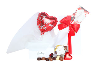 Gift Box Image Red air filled I love you balloon with chocolate packed in a deluxe white gift box tied with red ribbon and a bow from Batenburg's Gift Hampers Batenburgs Gift Baskets Auckland 