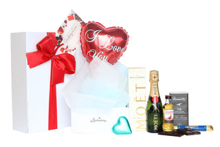 Gift Box Image Rectangle white gift box with Heart shaped I love you 9 inch air filled balloon, Mini Moët 200ml, Bennett's of Mangawhai chocolate bar, Whittaker's chocolate bar 25g Batenburgs Gift Baskets Auckland 