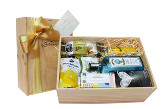 Gift Box Image New Zealand Gift Baskets. Gin and Tonic water gift hamper with lemon juice, chocolate and nibbles. Batenburgs Gift Hampers New Zealand Batenburgs Gift Baskets Auckland  Batenburgs Gift Baskets Auckland