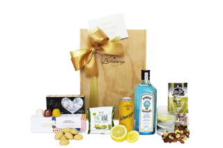 Gift Box Image Large wooden gift box with Bombay Sapphire 750ml, House of Chocolate bonbons three pack, raw nuts, Schweppes Tonic water, chedder and pepper savoury bites and olive Batenburgs Gift Baskets Auckland  Batenburgs Gift Baskets Auckland