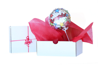 colourful 9" air filled balloons are delivered inside a white gift box to surprise and delight the lucky recipient. Perfect as a beautiful gift delivered NZ wide by Batenburgs Gift Hampers