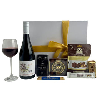 Gift Box Image Large white luxury gift box with Pinot noir Leefield  wine 750ml, peanut slab, espresso chocolate bar, Bennett's of Mangawhai chocolate bar, chocolare covered hokey pokey and Luxury chocolate selection from Devonport Chocolates Batenburgs Gift Baskets Auckland 