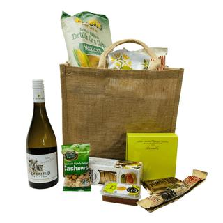 Gift Box Image Summer Sustainable picnic gift bag with Sauvignon Blanc, Bennetts Chocolate 9 pack, caramel popcorn, sea salted peanuts, bierstick, fruit paste, pretzels, cococup with strawberry, Mexican corn chips, caramel popcorn Batenburgs Gift Baskets Auckland