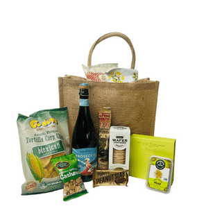 Gift Box Image Summer Sustainable picnic gift bag with Prosecco, Bennetts Chocolate 9 pack, caramel popcorn, sea salted peanuts, bierstick, fruit paste, pretzels, cococup with strawberry, Mexican corn chips, caramel popcorn Batenburgs Gift Baskets Auckland