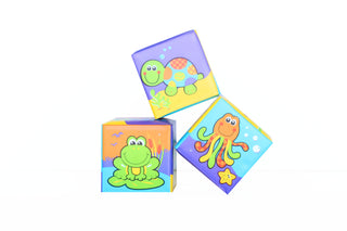 Three soft blocks for babies with prints of frogs, octopuses and turtle