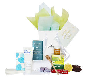 Gift Box Image White gift bag with tissues, Rich and George gel cleanser, Bennett's of Mangawhai chocolate 60 grams, cough drops, green tea bag box, J.Friend and Co honey pot 40ml Batenburgs Gift Baskets Auckland 