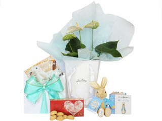 Gift Box Image Flowers in white gift bag with blue Vilene, shortbread bites, Peter Rabbit soft toy and book Batenburgs Gift Baskets Auckland 