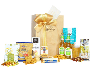 Gift Box Image Large wooden gift box with two Somersby apple cider 330ml, pretzel mix, salsa corn ships, crackers, fruit paste, two Whittaker's chocolate bars 25g, crispy corn nibbles and raw nut mix Batenburgs Gift Baskets Auckland 