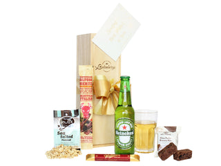 Gift Box Image Single bottle wooden gift box with 330ml Heineken beer, Whittaker's dark chocolate bar 25g, sea salted peanuts, biersticks and Mrs Higgin's brownie bite Batenburgs Gift Baskets Auckland 